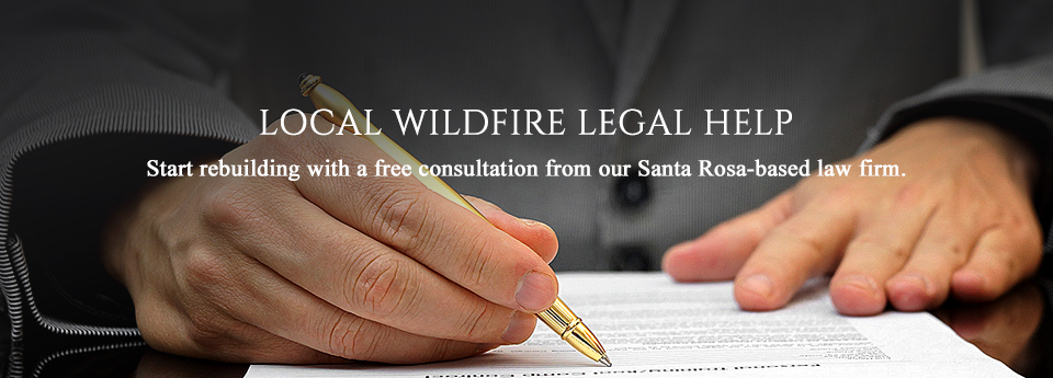 Hands signing legal contract for wildfire victims